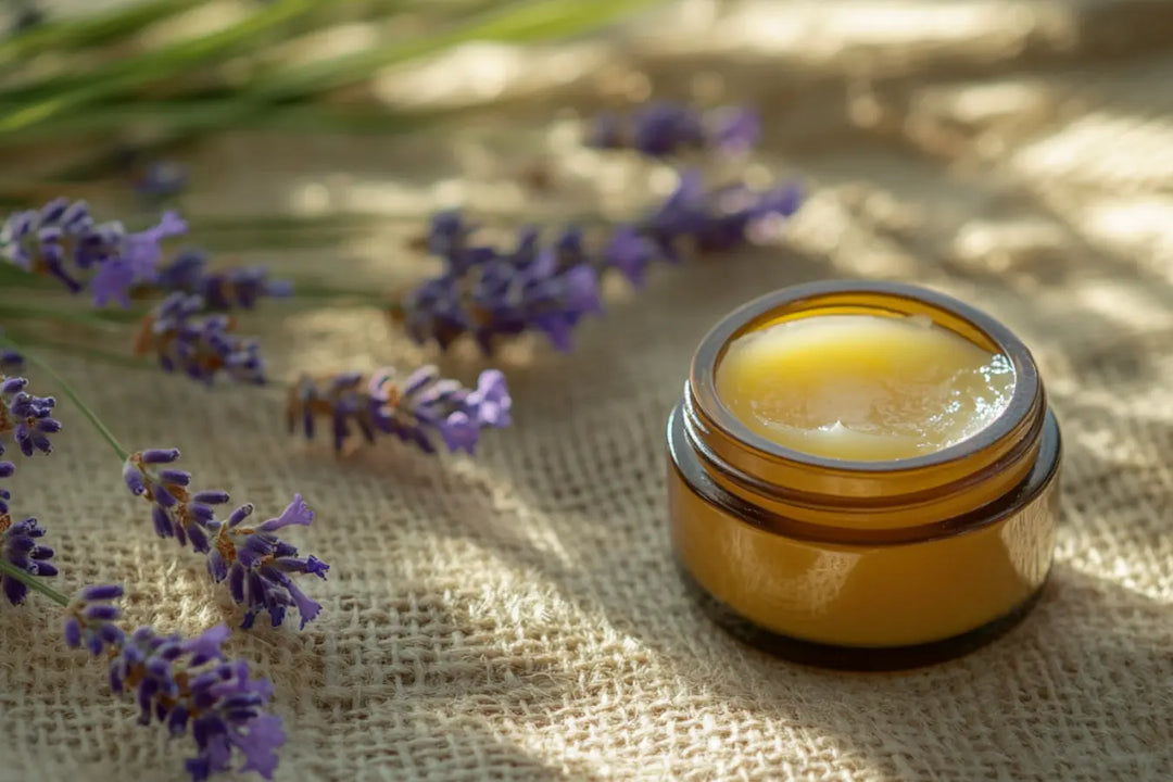 Homemade Lavender Chamomile Nappy Balm Go Native NZ recipe in amber glass pot, on hessian with lavender flowers