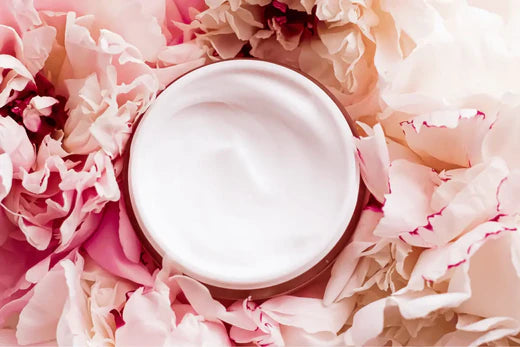 Go Native NZ recipe Luxurious Cream in pot surrounded by pink flower petals