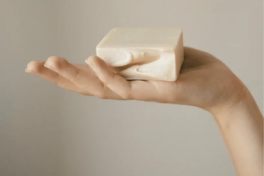 DIY Moisturising Lotion Body Bar in palm of a womans hand