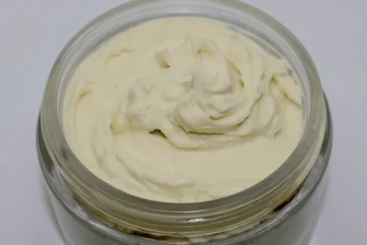 Whipped Shea Butter Go Native NZ recipe piped into glass jar, light luxurious cream colour