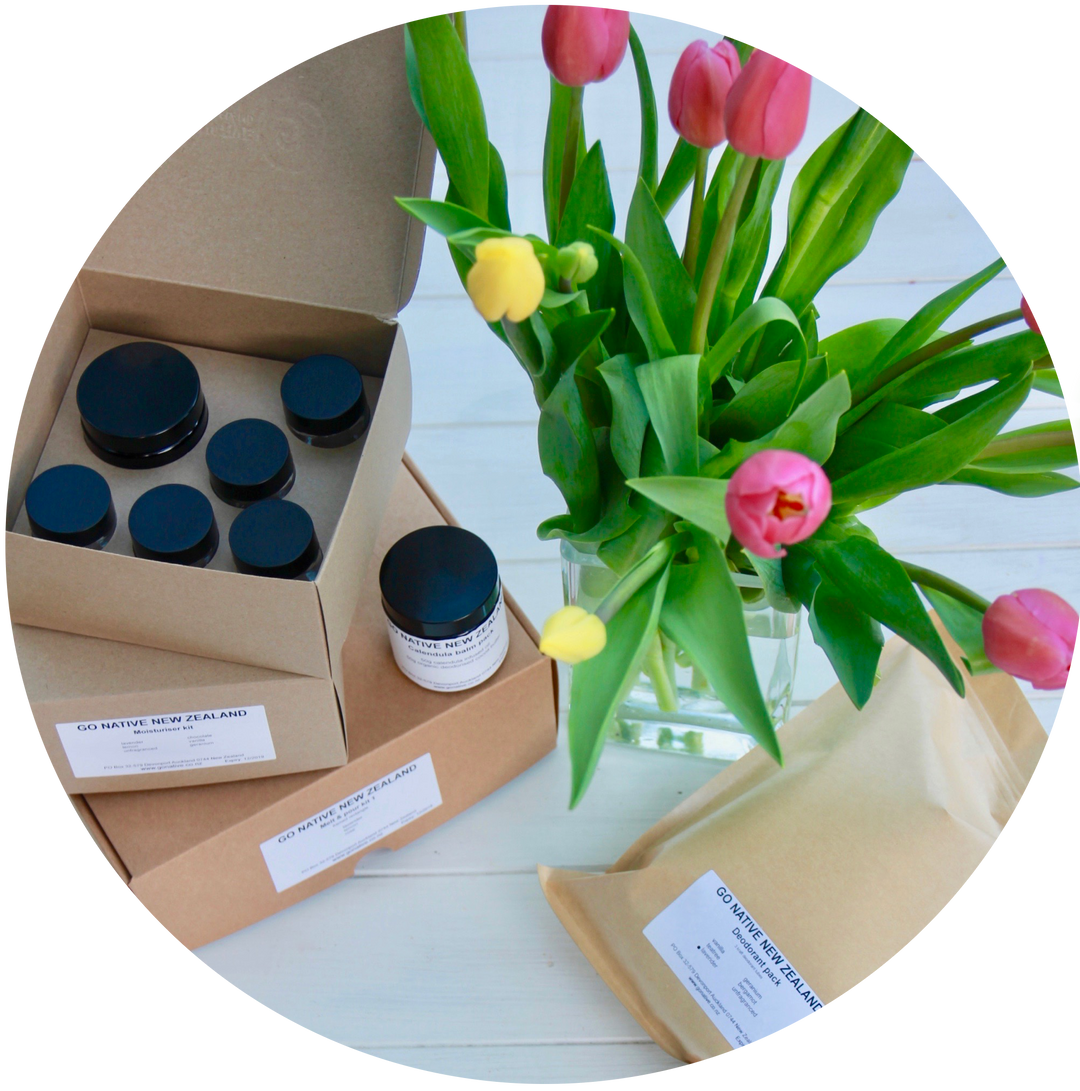 Make your own DIY go native kits in a pile, on box is open showing jars, flowers in vase